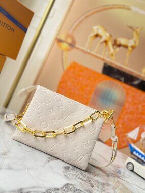 AUTHENTIC Louis Vuitton bag COUSSIN PM bag